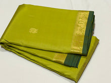 Sahana- Stunning Bright Lime Green with Gold Small Borders with Buttas Handwoven Pure Kanjivaram Silk with Bottle Green Selvedges Rich Pallu and Self Colored blouse
