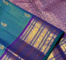 Sahana- Gorgeous Peacock Bluish Green with Purple Handwoven Pure Jari Kanjivaram Silk with Vairaoosi with buttas woven beautiful body with varisaipet borders with green selvedges rich pallu and contrast woven blouse