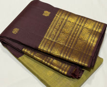 Vaibhogam- Gorgeous Elaichi Green with Coffee Brown Vairaoosi with Buttas Handwoven Pure 2g Jari Kanjivaram Silk with beautiful broad coffee brown borders rich pallu and contrast woven blouse