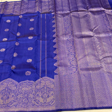 Vaibhogam- Stunning Royal Blue with Gold Handwoven Pure 2g Jari Kanjivaram Silk with beautiful peacocks and iruthalaipakshi motits woven body with beautiful turning borders with gorgeous weaving rich pallu and buttas woven blouse