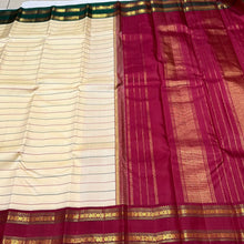 Vaibhogam- Fantastic Light Beige with Arakku and Green Handwoven Pure Jari Korvai Kanjivaram Silk with gorgeous neli veldhari woven body with rich rettapet borders gorgeous seepu rekku pallu and contrast woven arakku blouse