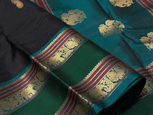 Black with Emerald Green Handwoven Pure Kanjivaram Silk Saree with thilagam buttas woven body doublepet borders elephants woven pallu and contrast blouse