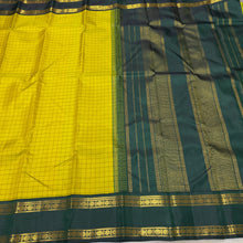 Sahana- Stunning Lemon Sampanga with Bottle Green Handwoven Pure 2g Jari Korvai Kanjivaram Silk with Checked body with rettapet double borders rich pallu and contrast woven blouse