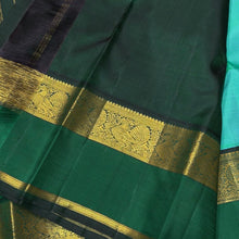 Vaibhogam- Beautiful Light Green with Dark Bottle Green Handwoven Pure Zari Korvai Kanjivaram Silk with beautiful spaced light and dark green double borders rich seer pallu and contrast woven bottle green blouse