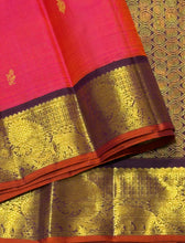 Vaibhogam-Beautiful Double tone Tomato Pink with deep maroonish brown with orange selvedges Handwoven Pure Korvai Kanjivaram Silk with floral buttas woven body beautiful elephants and annapakshis woven gorgeous borders rich pallu and contrast woven blouse