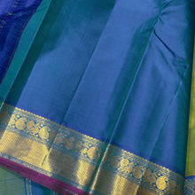 Nayaki- Gorgeous Parrot Green with Peacock Blue tone  Handwoven Pure Kanjivaram Silk with beautiful bawanchi borders with rich pallu and contrast woven blouse