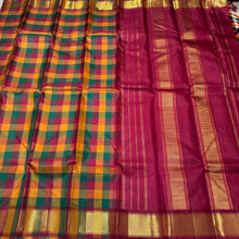 Palum Pazhamum Checks with Arakku  mayilkan borders classic seer rich pallu and contrast woven blouse