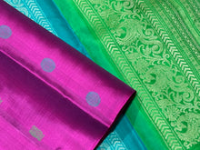 Gorgeous Purple with Turquoise Blue and Parrot Green Handwoven Pure Kanjivaram Silk with Pattu Buttas Woven body with double colored pallu and contrast zari striped parrot green blouse