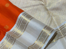 Vaibhogam-Gorgeous Orange with Offwhite Handwoven Pure Jari Korvai with Mayil Chakram Buttas woven body beautiful rettaipet with zari oosi striped borders rich pallu and contrast woven blouse. A stunner for this wedding season!