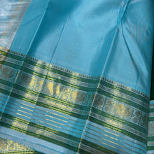 Mindblowing Handwoven Pure Korvai Kanjivaram Silk Saree in Bottle Green with Ice Blue combination with buttas woven body rich varisaipet meenakari borders beautiful pallu and contrast woven blouse