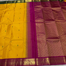Vaibhogam- Gorgeous Mustard with Magenta and Bottle Green Handwoven Pure Jari Korvai Kanjivaram Silk with thread buttas woven body with beautiful ganga jamuna borders rich pallu and contrast woven blouse