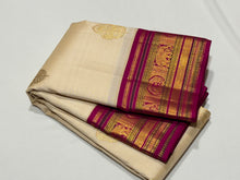 Vaibhogam-Mindblowing Offwhite with Pink Handwoven Pure Jari Korvai Kanjivaram Silk Saree with rich Buttas Woven Body with intricate Meenakari Work Borders Gorgeous Pallu and Contrast woven blouse