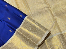 Vaibhogam -Gorgeous Royal Blue with Offwhite Handwoven Pure Jari Korvai Kanjivaram Silk Saree with Beautiful Buttas Woven Body rich and Intricate Borders Pallu and Contrast woven blouse