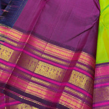 Vaibhogam- Mesmerising Parrot Green with Deep Magenta Handwoven Pure Jari Korvai Buttas Woven Kanjivaram Silk with beautiful varisaipet borders gorgeous pallu and contrast woven blouse
