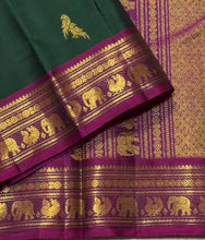 Sahana- Stunning Bottle Green with Deep Magenta Handwoven Pure Jari Rettaikili Buttas Handwoven Kanjivaram Silk with gorgeous Borders and Pallu woven with lot of details and contrast woven blouse