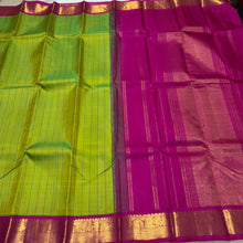 Sarasangi- Stunning Parrot Green with Pink Handwoven Pure Jari Korvai Kanjivaram Silk with beautiful checked body rich borders pallu and contrast woven blouse