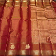 Vintage Weave-Rustic Orange with Jari Oosi Kattam and Gandaberunda and Yazhi motifs woven Borders in a Handwoven Pure Jari Kanjivaram Silk Saree Beauty