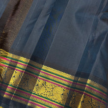 Vaibhogam-Gorgeous Yellow with Deep Sapphire Blue Handwoven Pure Jari Korvai Kanjivaram Silk with Pattu Buttas Woven Body with Rich and Intricate Meenakari work Borders Gorgeous Pallu and Contrast Woven Blouse
