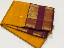 Vaibhogam- Gorgeous Mustard with Deep Maroon Buttas Handwoven Pure Jari Korvai Kanjivaram Silk with Doublepet borders rich pallu and contrast woven blouse