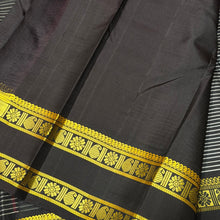 Saraswati- Stunning Deep beetlenut purplish brown handwoven pure zariless kanchipuram silk with striped body with rettapet green and yellow colors kamalam and paisley motifs woven beautiful borders classic seer pallu and contrast woven blouse