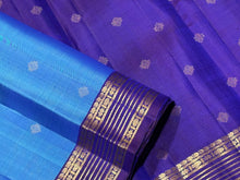 Sahana-Gorgeous Light  Blue with Deep Purplish Blue Buttas Handwoven pure Kanjivaram Silk wirh beautiful  borders rich pallu and contrast woven blouse