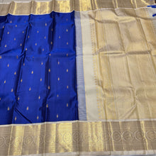Vaibhogam -Gorgeous Royal Blue with Offwhite Handwoven Pure Jari Korvai Kanjivaram Silk Saree with Beautiful Buttas Woven Body rich and Intricate Borders Pallu and Contrast woven blouse