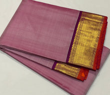 Nayaki- Gorgeous Lotus Pink with Purple Handwoven Pure Kanjivaram Silk with beautiful bawanchi borders with rich pallu and contrast woven blouse