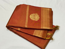 Vintage Weave-Rustic Orange with Jari Oosi Kattam and Gandaberunda and Yazhi motifs woven Borders in a Handwoven Pure Jari Kanjivaram Silk Saree Beauty