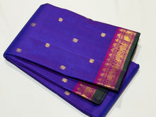 Sahana- Violetish Blur with Magenta Pink Buttas Handwoven Pure Jari Kanjivaram Silk with elephants and peacocks motifs woven body with beautiful borders with green selvedges rich pallu and contrast woven blouse