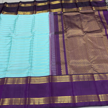 Vaibhogam- Mesmerizing Powder Blue with Deep Purple HandwovenPure jari Korvai Kanjivaram Silk with Jari Veldhari Stripes woven beautiful body with rettapet borders with stunning rich and finely woven pallu and contrast zari striped beautiful blouse