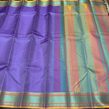 Saraswati- Beautiful Lavendar with Green and Yellow Handwoven Premium Zariless Kanjivaram Silk with Muthukattam Self Checked body with beautiful borders rich pallu and contrast jacquard woven beautiful blouse