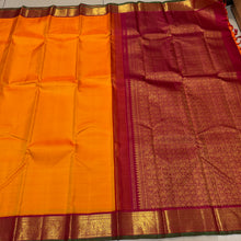 Sarasangi- Vintage Style Mambazham Yellow with Arakku Handwoven Pure 2g Jari Korvi Kanjivaram Silk with Green Selvedges with beautiful gandaberundas woven borders rich pallu and contrast woven blouse