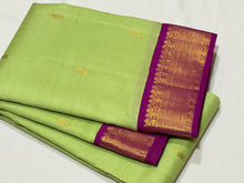 Gorgeous Pista Green with Vadamalli Purplish Pink Buttas Korvai Handwoven Pure Jari Kanjivaram Silk Saree Beauty