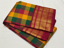 Gorgeous Palum Pazhamum Checks in a beautiful Korvai Handwoven Pure Jari Kanjivaram Silk Saree with very intricately woven vanki borders and inbetween mayilkan motifs woven with rich and finely woven pallu in arakku with laksham buttas and contrast blouse