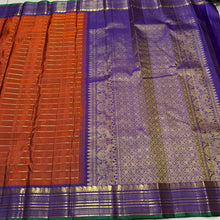 Sahana- Stunning  Rust Orange with Purple Handwoven Pure Jari Kanjivaram Silk with Jari Veldhari Body with rich borders pallu and contrast woven blouse