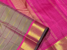 Sahana-Beautiful Dual tone Manthulir Green with Rani Pink Combo in a Handwoven Pure Kanjivaram Silk with Neli Veldhari Striped Body with beautiful mayilkan borders with green selvedges rich seer pallu and contrast woven pink blouse