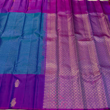 Sahana- Gorgeous Peacock Blue with Purple Kottadi Jari Checked body with beautiful buttas woven borders on either sides with rich pallu and contrast woven blouse