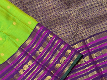 Vaibhogam -Gorgeous Sneha Green with Deep Purple Handwoven Pure Jari Korvai Kanjivaram Silk Saree with rich kamalam buttas woven body with elephants and annapakshis woven varisaipet broad borders gorgeous pallu and contrast woven blouse