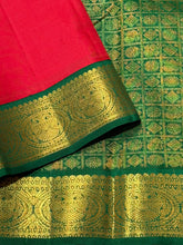 Sarasangi- Gorgeous Red with Emerald Green Handwoven Pure Jari Korvai Kanjivaram Silk with beautiful gandaberundas woven borders with rich 1000 buttas pallu and contrast emerald green blouse beauty