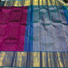 Vaibhogam- Vintage Inspired Beautiful Deep Wine with Peacock Blue Handwoven Pure Jari Korvai Kanjivaram Silk with missing checks style woven body with small buttas all over with beautiful rich borders pallu and contrast self striped blouse