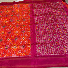 Arabhi- Stunning Orange with Pink in a beautiful Handwoven Premium Zariless Double Ikat Silk with rich woven body gorgeous pallu and contrast woven blouse