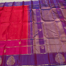 Vaibhogam- Stunning Orange, Pink with Purple Handwoven Pure 2g Jari Kanjivaram Silk with buttas woven body with middle portion in orange lower portion in pink and borders pallu and blouse in beautiful purple with border motifs woven beautifully!