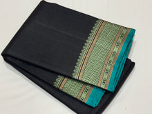 Mindblowing Black with Teal Handwoven Pure Zariless Kanjivaram Silk with intricately woven self Muthukattam body checks rich borders gorgeous pallu and Jacquard blouse beauty