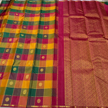 Saranga- Gorgeous Palum Pazhamum Checks With rudrakshapet borders with beautiful paisleys and chakram buttas woven body with neli veldhari horizontally and vertically checked body with rich arakku pallu and contrast beautifully woven blouse