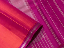Nayaki- Gorgeous Orange Pink with Pink Handwoven Pure Kanjivaram Silk without zari with a beautiful small borders with pillayar moggu with rich seer pallu and contrast woven blouse