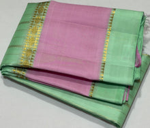 Sahana- Gorgeous Pastel Pista Green with Lotus Pink Handwoven Pure Jari Kanjivaram Silk with Striped body beautiful borders rich pallu and contrast woven blouse
