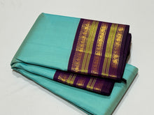 Gorgeous Turquoise Blue with Deep Purple  Kai Korvai Handwoven Pure Jari Kanjivaram Silk Saree with intricate meenakari varisaipet borders with rich pallu and contrast woven blouse beauty