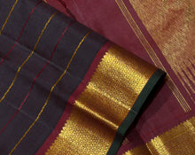 Sahana- Gorgeous Coffee Brown with Maroonish Brown Handwoven Pure 2g Jari Kanjivaram Silk with Neli Veldhari woven beautiful body with rich borders with green selvedges beautiful seer pallu and contrast woven blouse