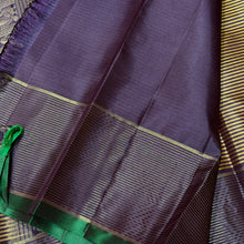 Sahana- Gorgeous Bronze Gold with Deep Purplish Brown Handwoven Pure Kanjivaram Silk with Striped body rich peacocks in paisley motifs woven borders with green selvedges rich pallu and contrast woven blouse