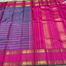 Sahana-Stunning Double tone Blue Green body with striped purple and green lines with gorgeous veldhari striped rettapet borders rich pink seer pallu and contrast woven blouse